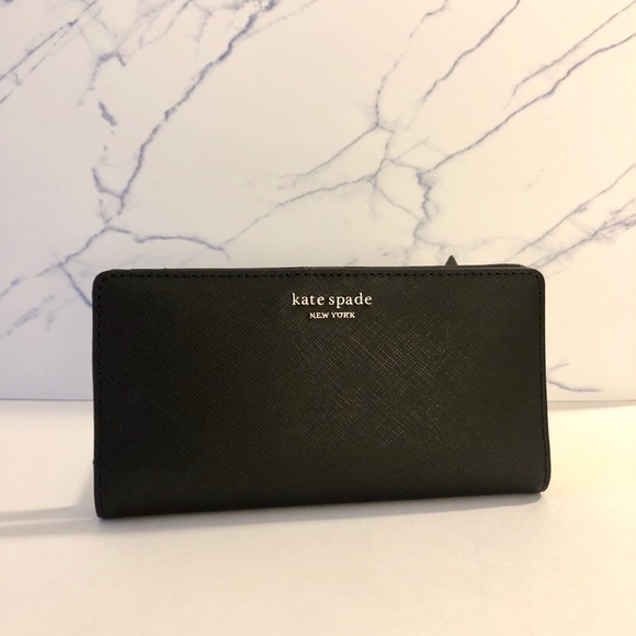 kate spade Handbags - Kate Spade Cameron Large Slim Bifold Wallet